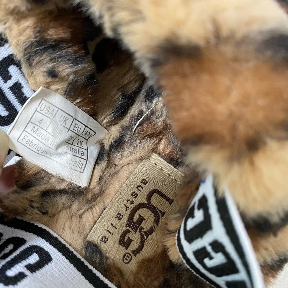 UGG Tan and Black Fuzzy Animal Print Slippers